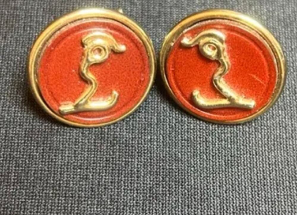 Vtg MCM Gold Tone Burgundy Monogram L?/Stylized Skier? Cufflinks